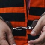 Ilustrasi tersangka kasus kejahatan diborgol