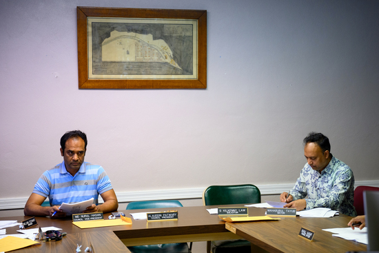 Md Nurul Hasan, left, vice president of the Millbourne borough council, and Mayor Mahabubul Tayub, right, during a council meeting on May 5, 2025. The two men ran against each other in the 2021 mayoral election.